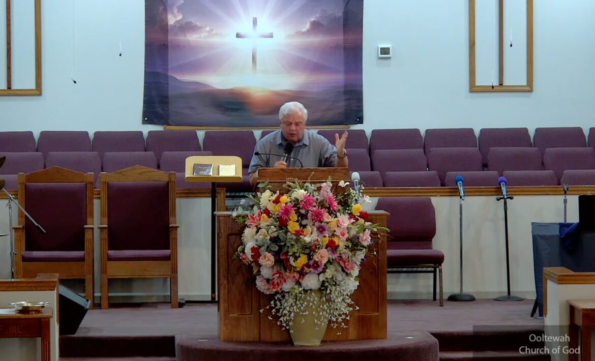Willard Griffin preaching.