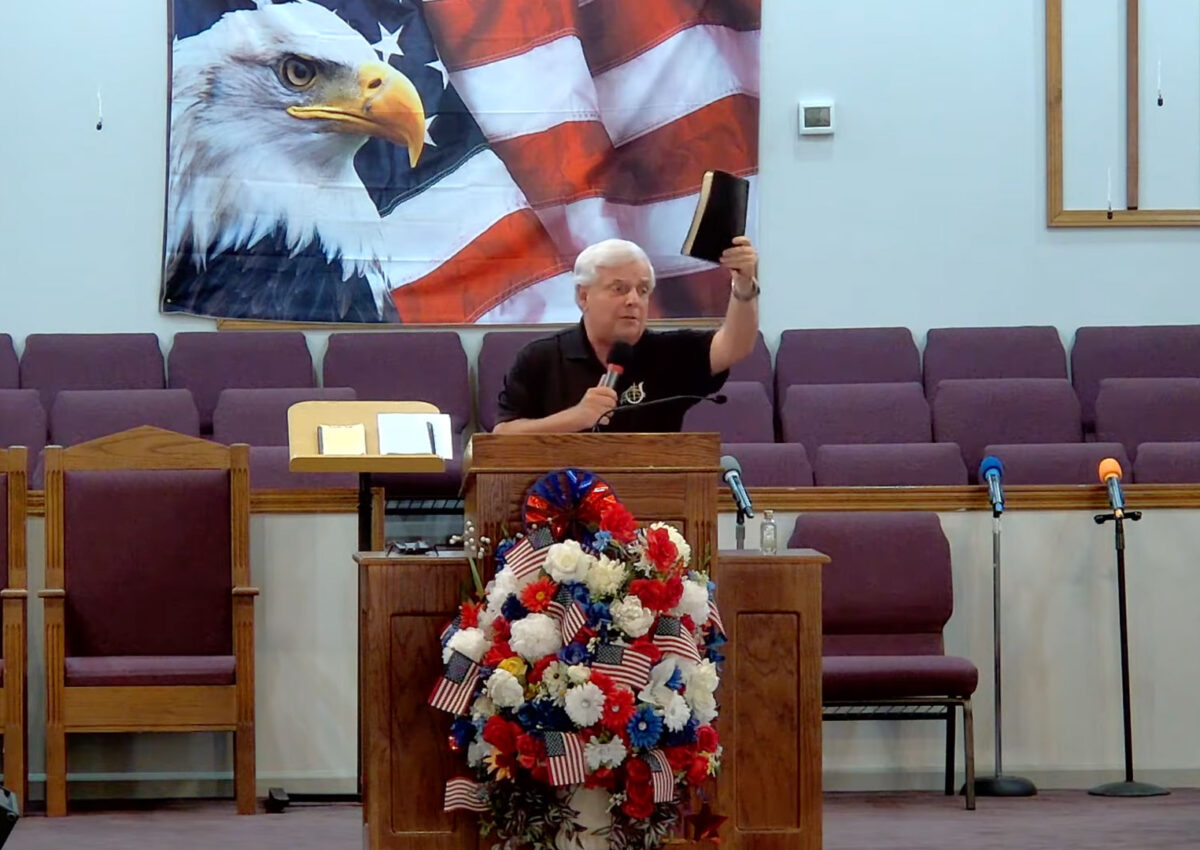 Willard Griffin preaching.