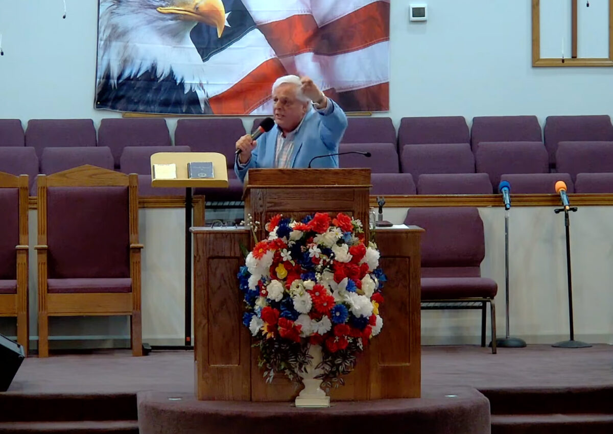 Willard Griffin preaching.
