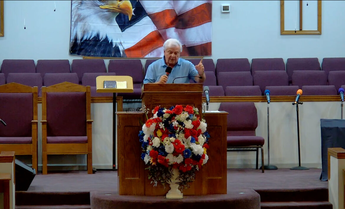 Willard Griffin preaching.