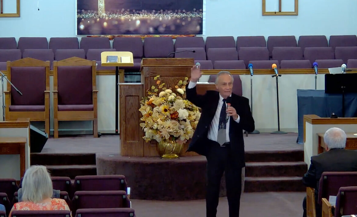 Clarence Gammill preaching.