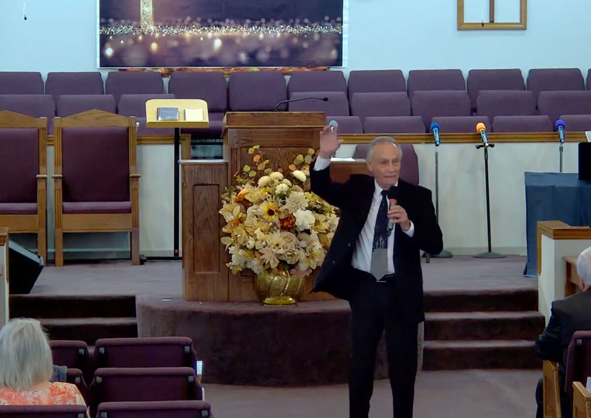 Clarence Gammill preaching.