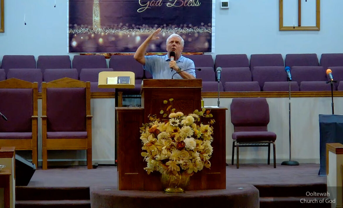 Willard Griffin preaching.