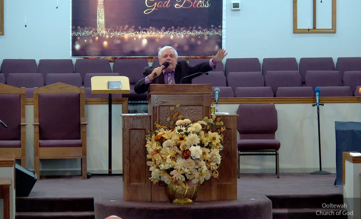 Willard Griffin preaching.