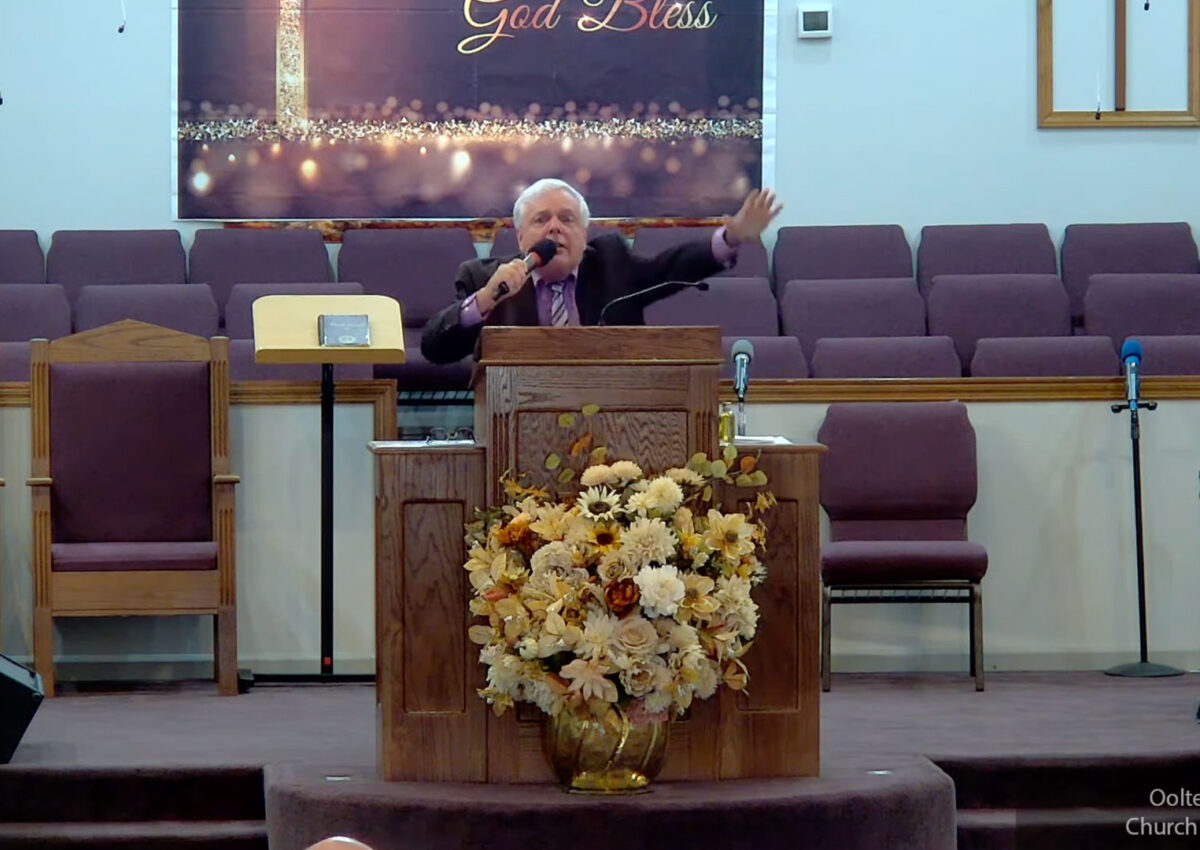 Willard Griffin preaching.